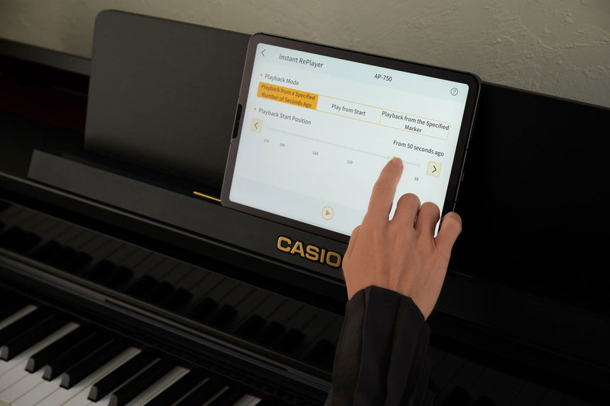 Casio AP-750BK digital piano in black – detail of tablet control on the music rest.