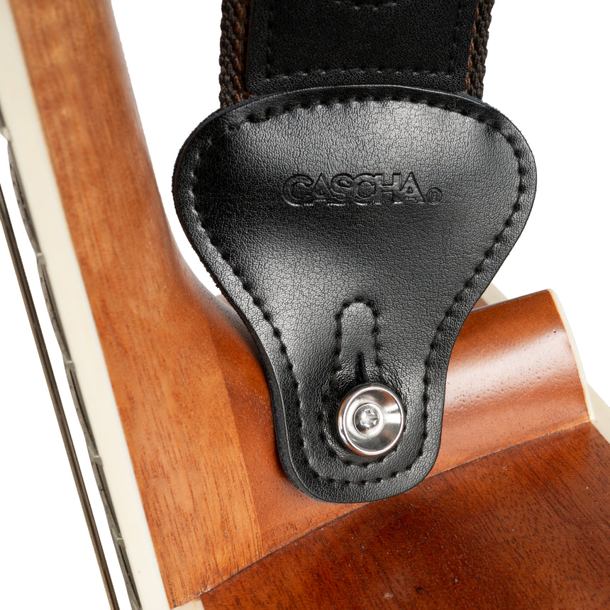 Cascha HH-2259, black, polyester/cotton – leather end on guitar, close-up
