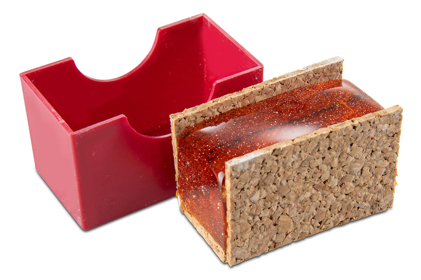 Walthari Karwendel rosin in cork sleeve beside the open red case